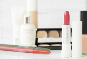 assorted-brand makeup lot on desk